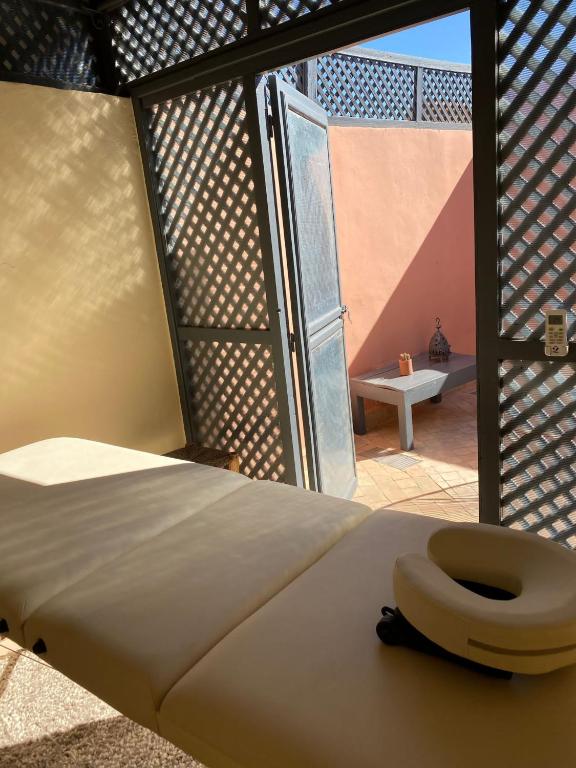 Letto o letti in una camera di Riad Magellan Yoga and Spa
