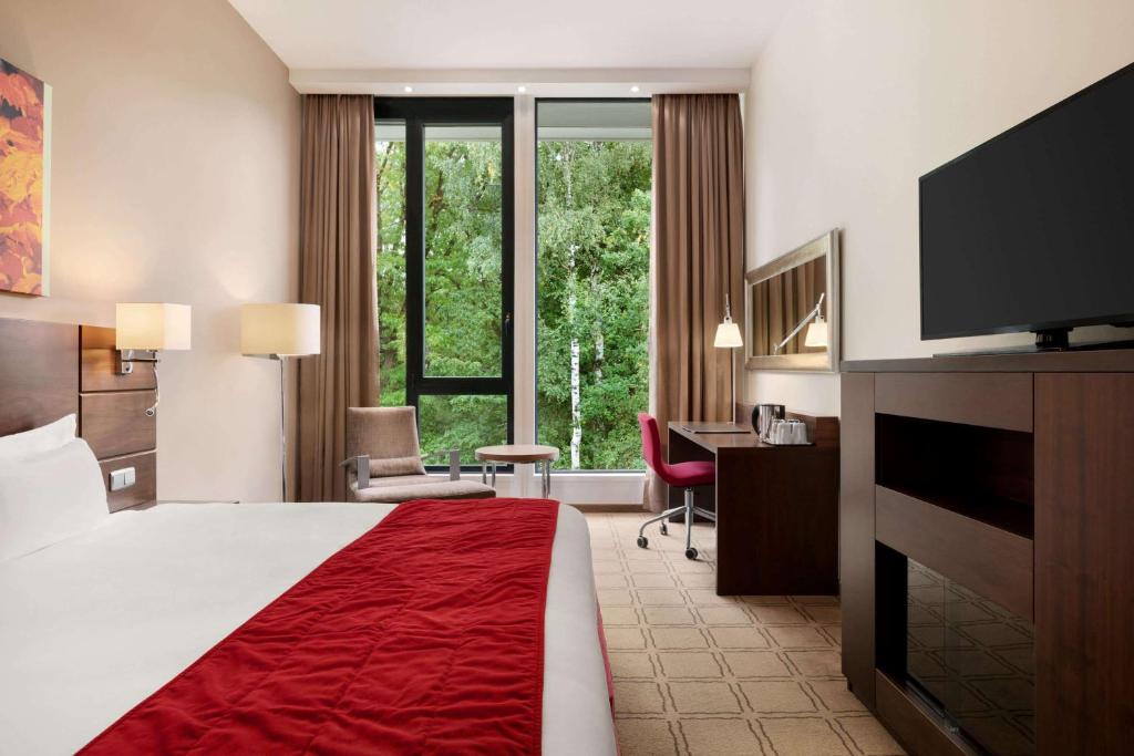 Postel nebo postele na pokoji v ubytování Hotel Dolce La Hulpe Brussels