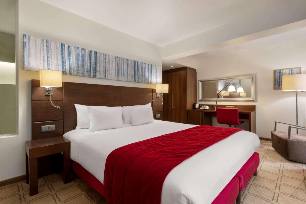 Postel nebo postele na pokoji v ubytování Hotel Dolce La Hulpe Brussels