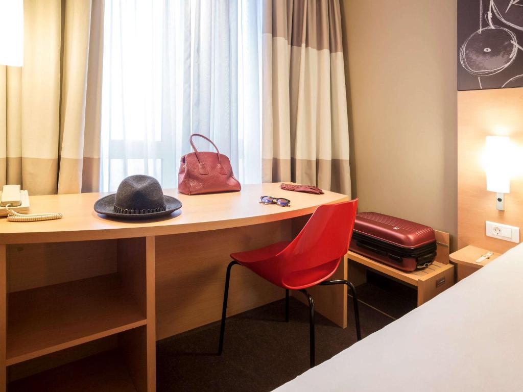 Postel nebo postele na pokoji v ubytování ibis Yerevan Center