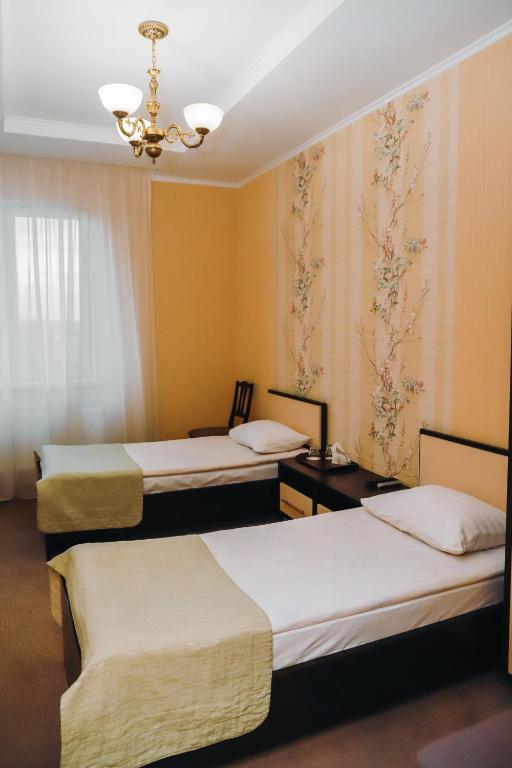 Готель Релакс - Chambre Double à Deux Lits