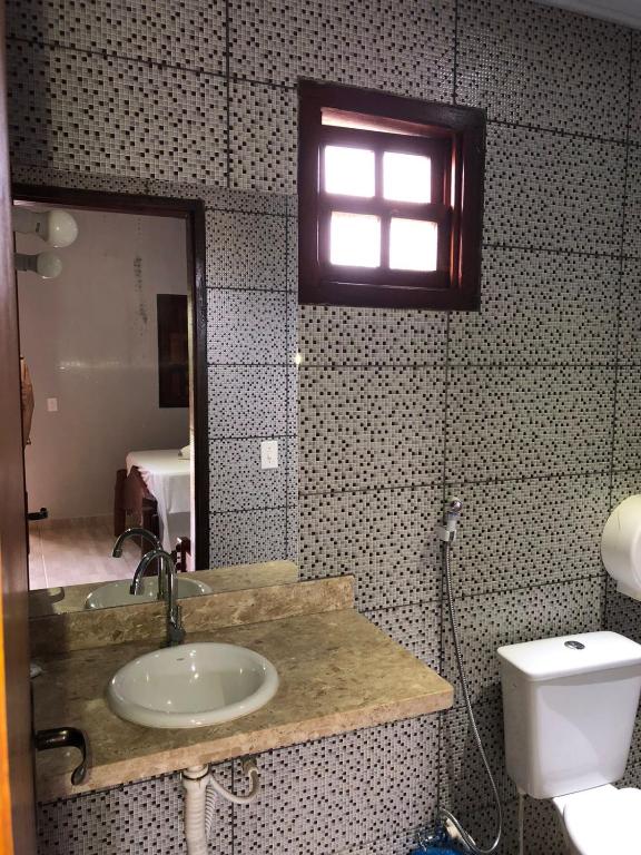 Uma casa de banho em Pousada Encanto dos Anjos