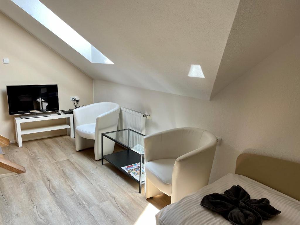 TV a/nebo společenská místnost v ubytování Penzion Apartmány Adamčík