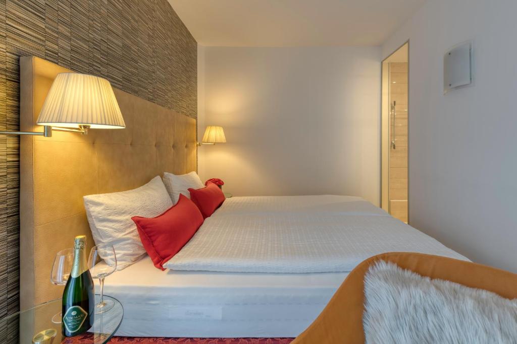Postel nebo postele na pokoji v ubytování Hotel Sporting Trento