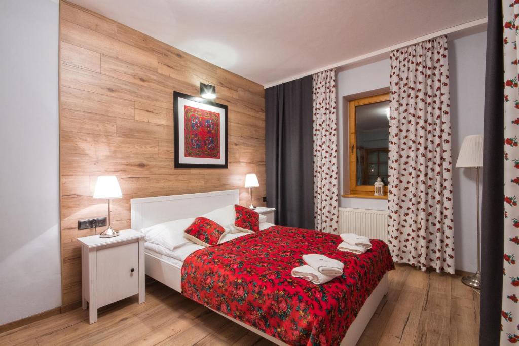 Krevet ili kreveti u jedinici u objektu ApartSerwis - Apartament Orkana Centrum