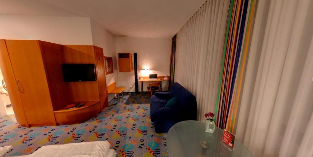 Postel nebo postele na pokoji v ubytování Business-Hotel Artes