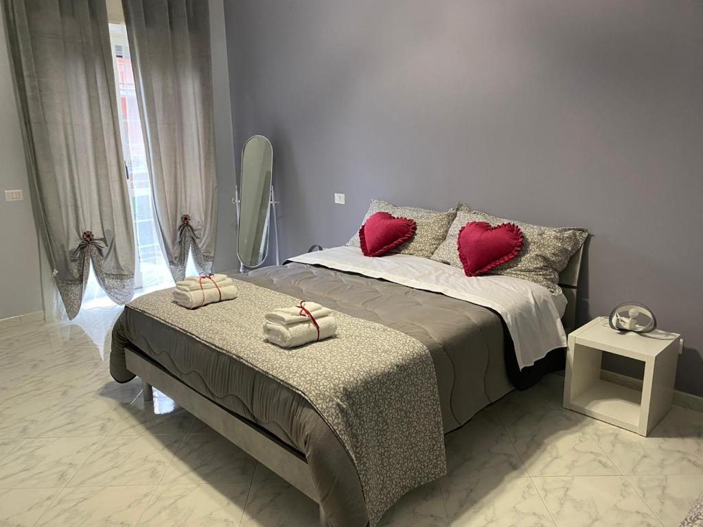 A bed or beds in a room at Affittacamere Iria