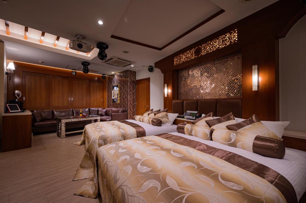 Postel nebo postele na pokoji v ubytování HOTEL Dior7つくば