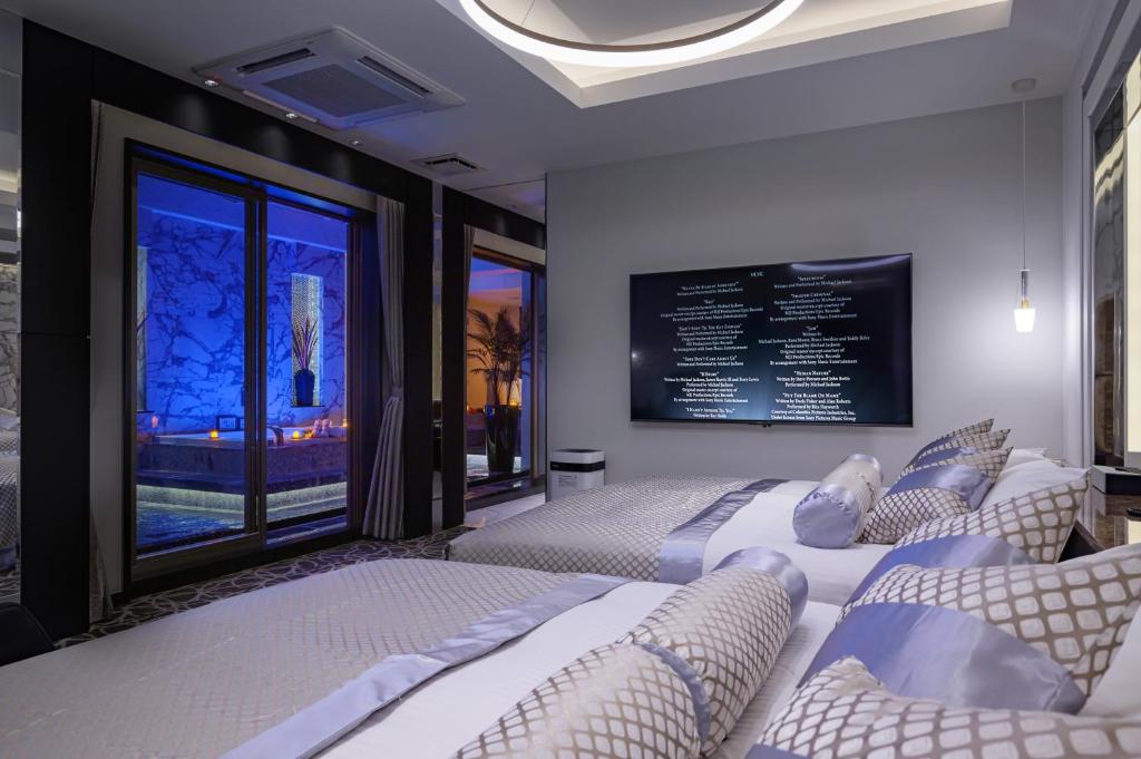 Postel nebo postele na pokoji v ubytování HOTEL Dior7つくば