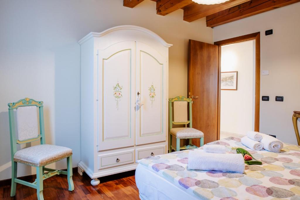 Postel nebo postele na pokoji v ubytování La Dolce Vita