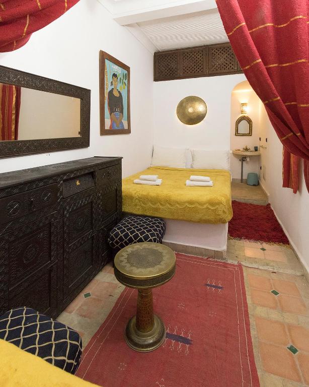 Postel nebo postele na pokoji v ubytování Riad Wardate Rita