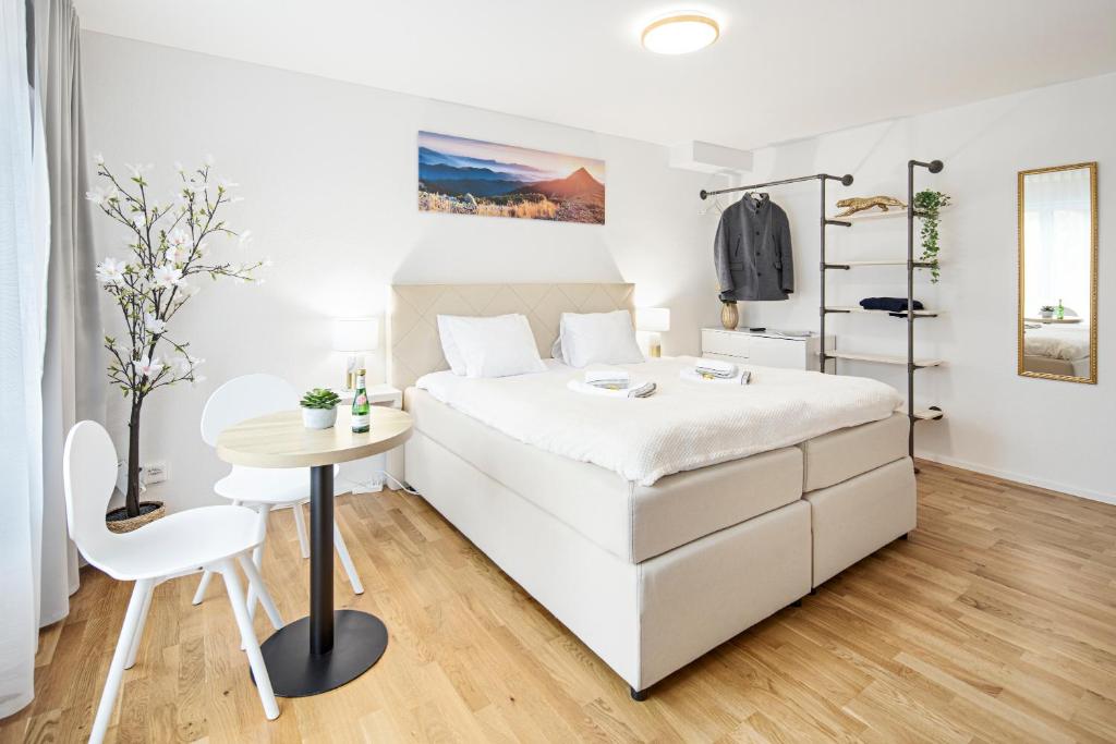 Postel nebo postele na pokoji v ubytování EH Apartments Mars