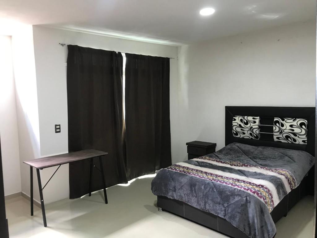 Postel nebo postele na pokoji v ubytování Casa minimalista tranquila y acogedora, con garage