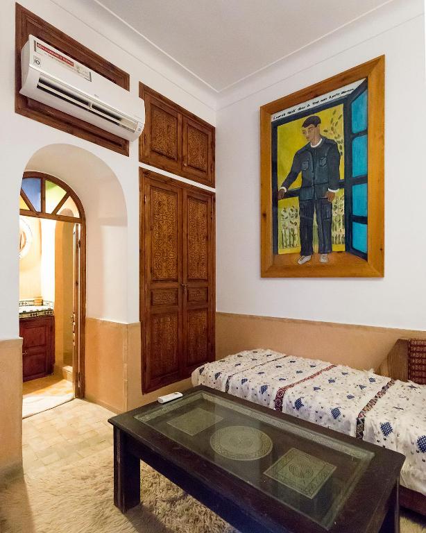 Postel nebo postele na pokoji v ubytování Riad Wardate Rita