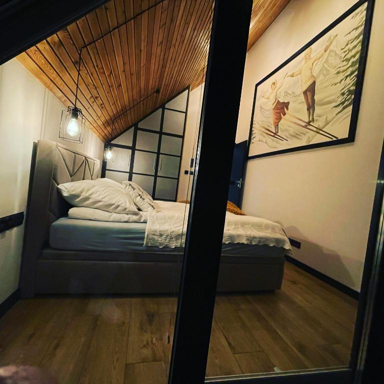 Posteľ alebo postele v izbe v ubytovaní Apartamenty Zielona 9
