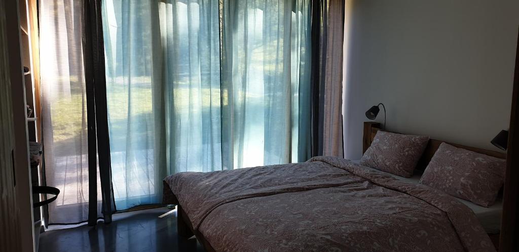 Postel nebo postele na pokoji v ubytování Pod Beskydem, Velké Karlovice