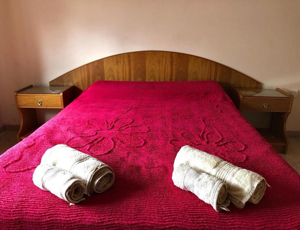 מיטה או מיטות בחדר ב-Hotel Ezpeleta