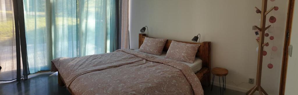 Postel nebo postele na pokoji v ubytování Pod Beskydem, Velké Karlovice