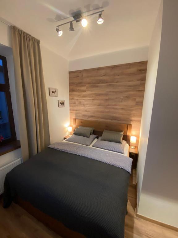 Łóżko lub łóżka w pokoju w obiekcie Yellow Ski Apartments