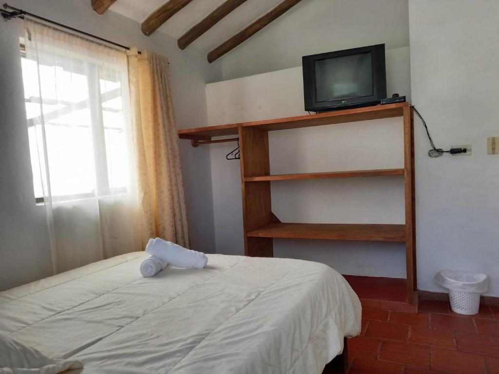 Postel nebo postele na pokoji v ubytování Cabaña Lewana Campestre