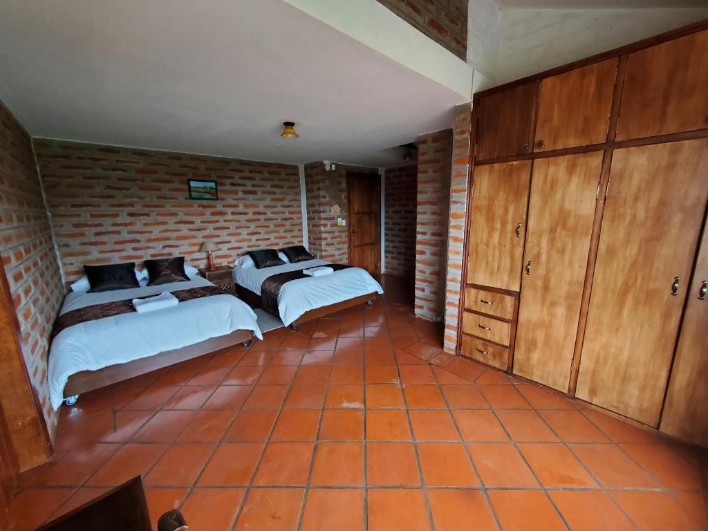 Balcon al Cotopaxi Hosteria - Triple Room With Mountain View