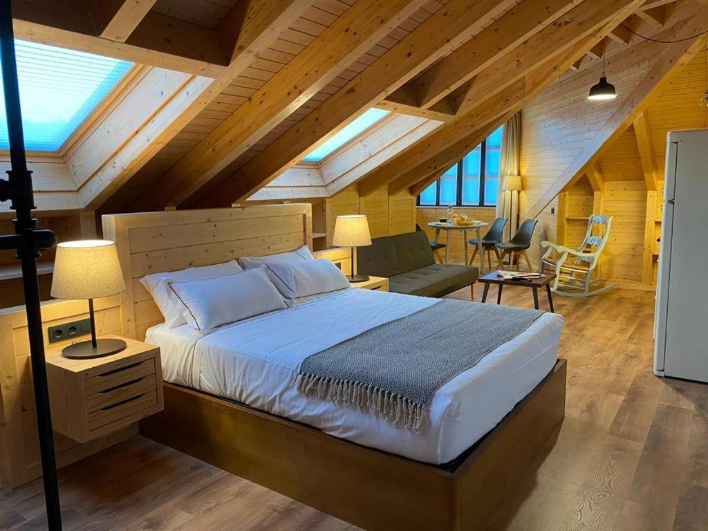 Ένα ή περισσότερα κρεβάτια σε δωμάτιο στο Apartamentos La Casina de los Músicos