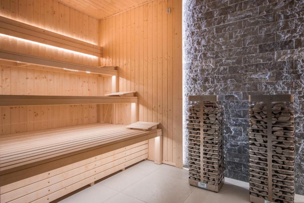 Posteľ alebo postele v izbe v ubytovaní ApartSerwis - Gorące Źródła Apartament Szałasówka