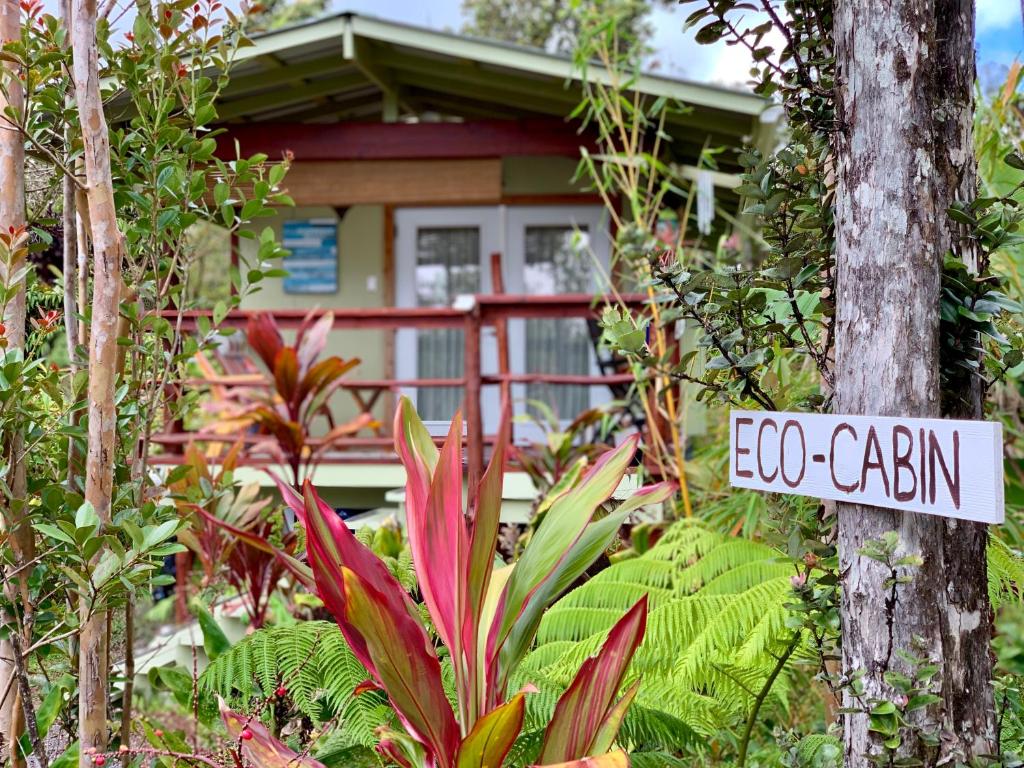 a sign that says ego garden in front of a house at Rainforest Eco Cabin in Volcano