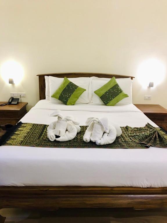 Postel nebo postele na pokoji v ubytování Samui Bayview Resort & Spa - SHA Plus