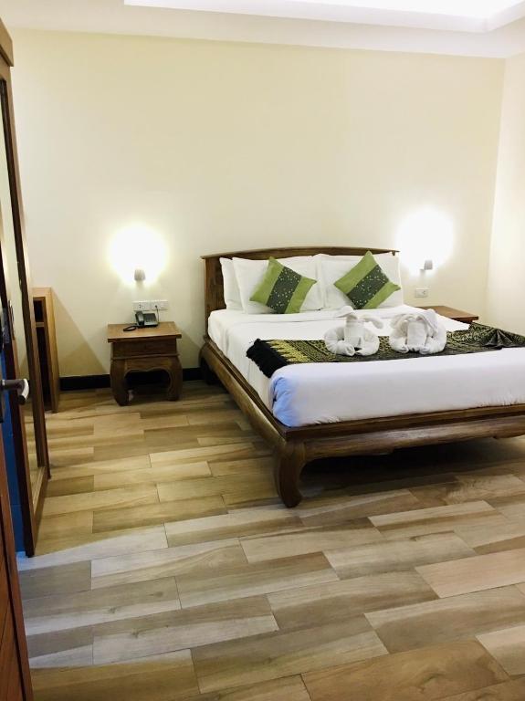Postel nebo postele na pokoji v ubytování Samui Bayview Resort & Spa - SHA Plus