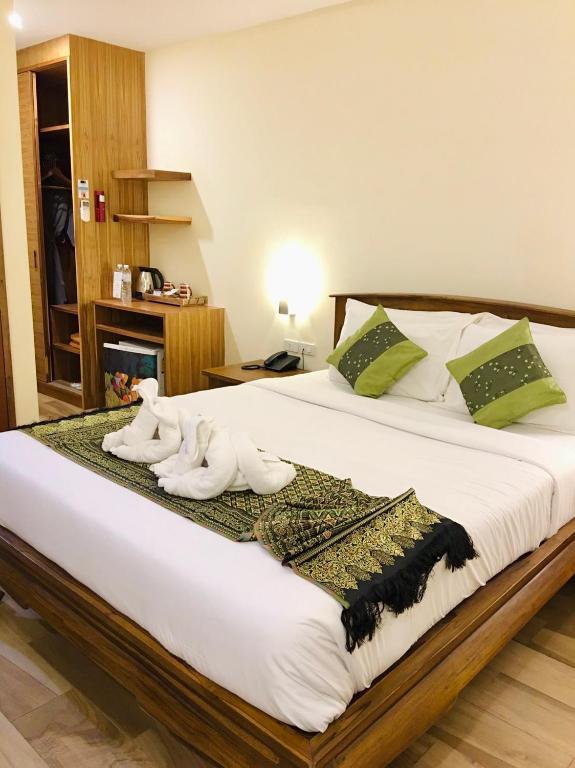 Postel nebo postele na pokoji v ubytování Samui Bayview Resort & Spa - SHA Plus