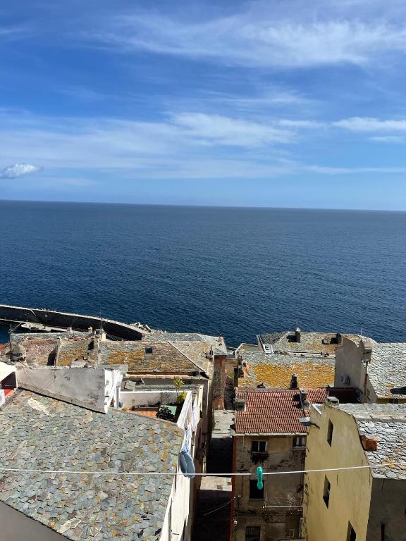 a view of the ocean from the top of a building at CASA GUASCO superbe duplex au cœur de la Citadelle, vue à 360 in Bastia