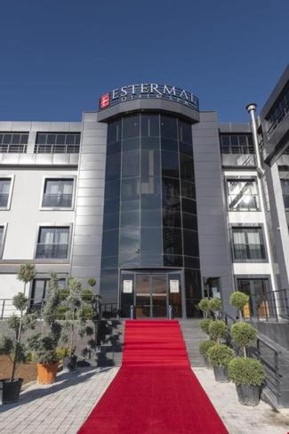 a building with a red carpet in front of it at ES TERMAL OTEL&SPA in Derekoy