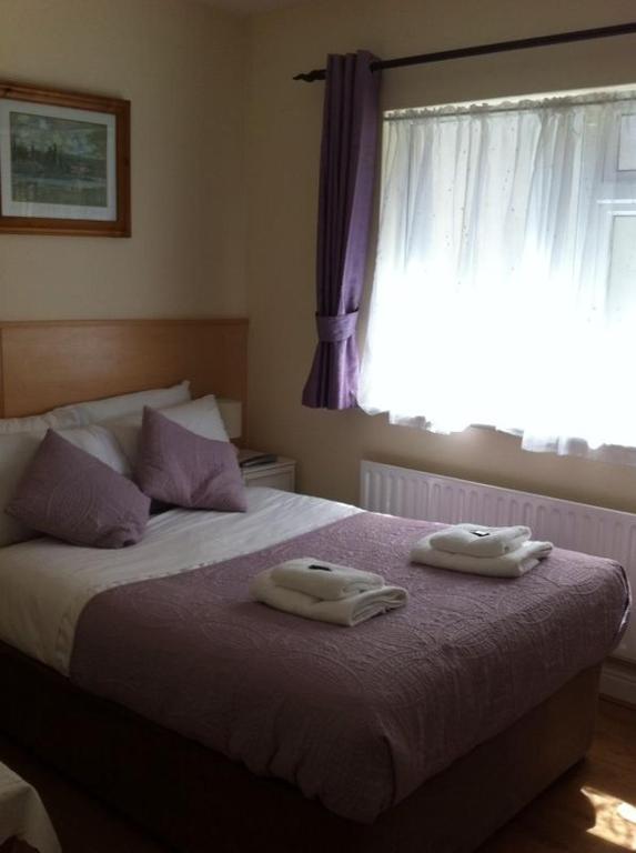 Postel nebo postele na pokoji v ubytování Ashling House Serviced Accommodation
