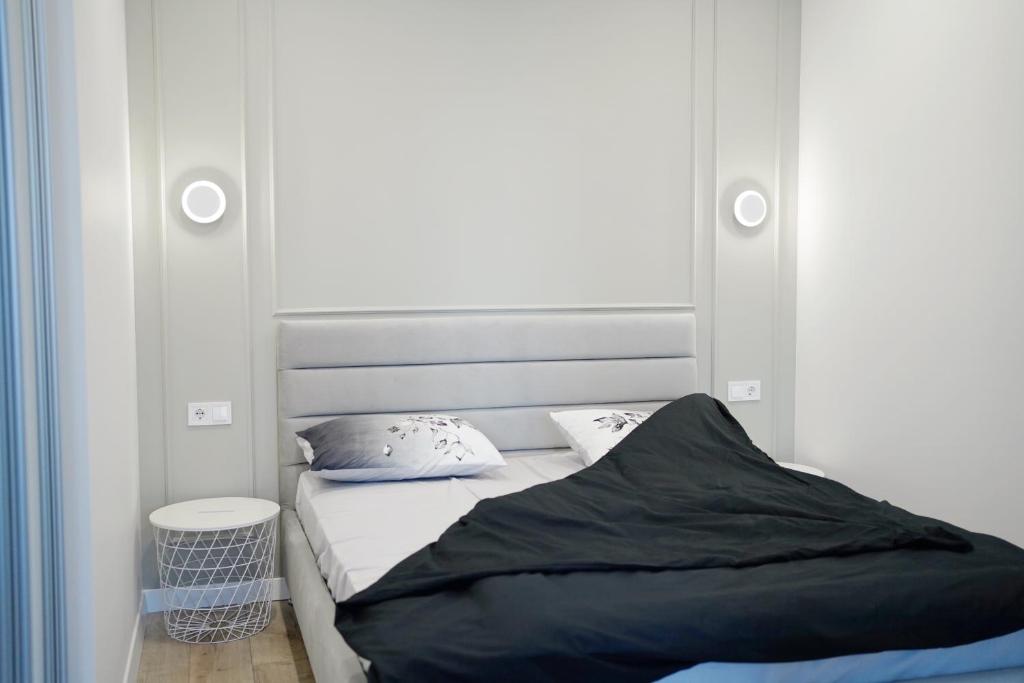 Un pat sau paturi într-o cameră la 51 Перлина апартаменти біля моря