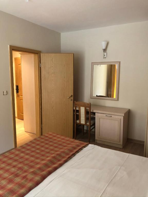 Postel nebo postele na pokoji v ubytování Vacation Apartment at Sunny Beach