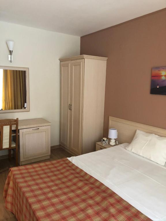 Postel nebo postele na pokoji v ubytování Vacation Apartment at Sunny Beach