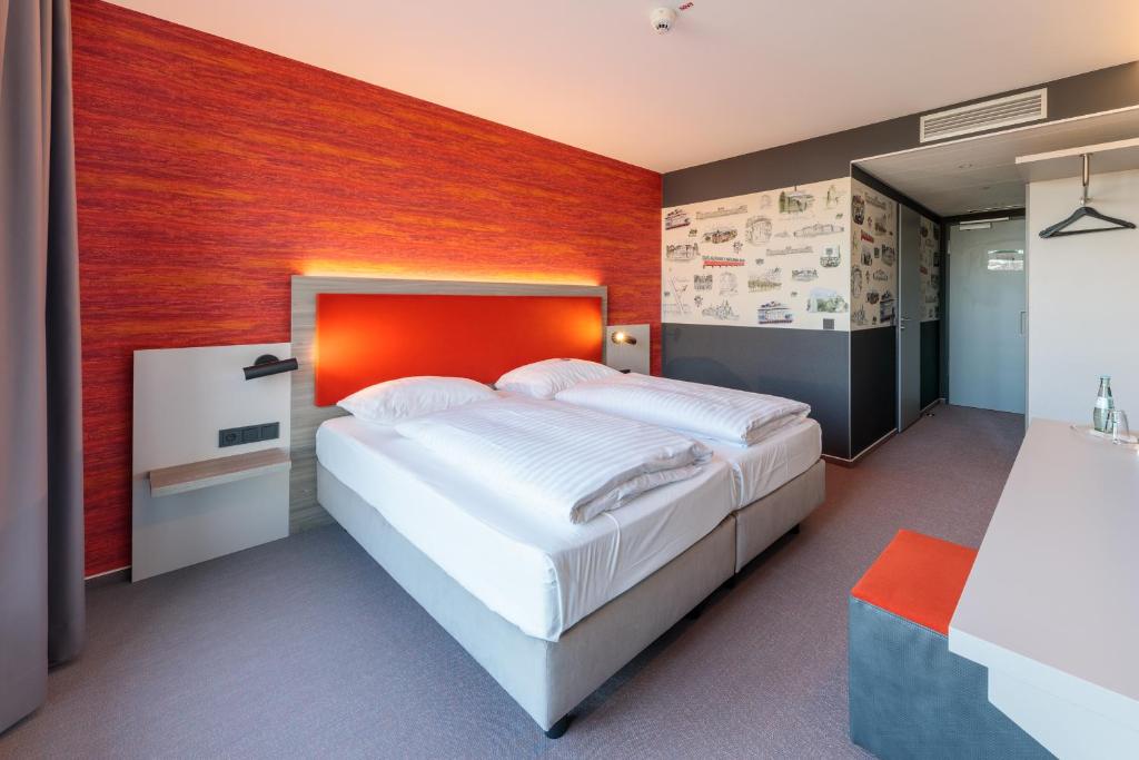 Postel nebo postele na pokoji v ubytování Hotel am Rüssel