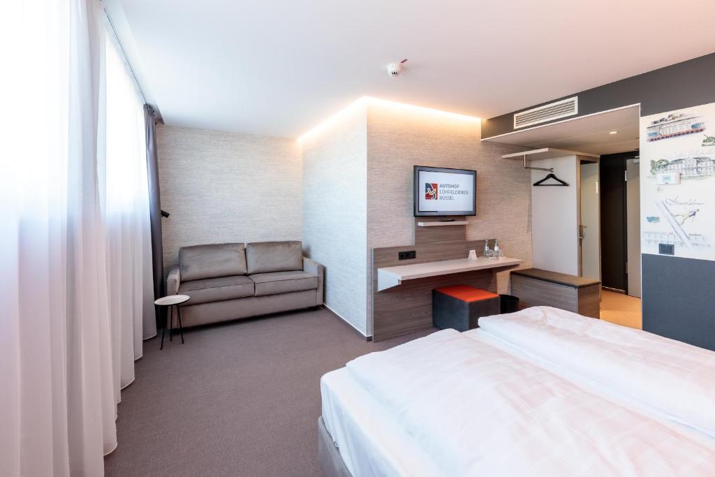 Postel nebo postele na pokoji v ubytování Hotel am Rüssel