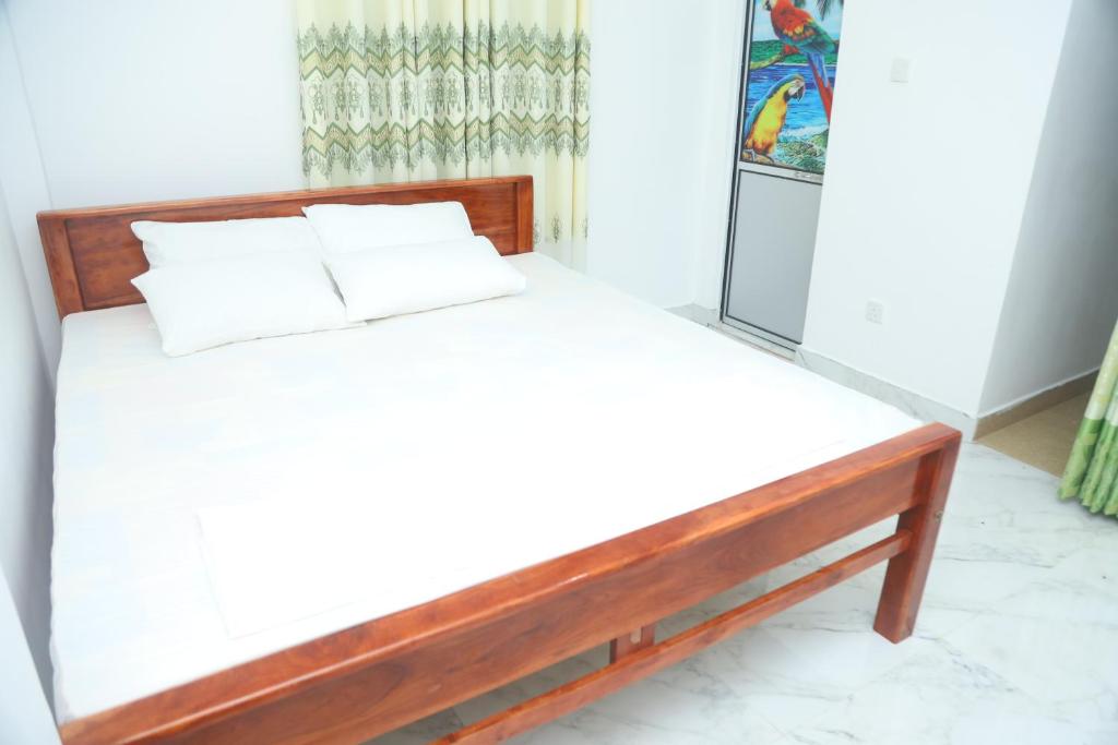 Postel nebo postele na pokoji v ubytování FOREST VIEW HOME STAY