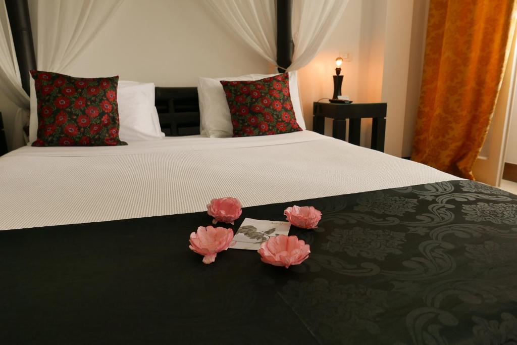 Postel nebo postele na pokoji v ubytování Aram Yamí Boutique Hotel