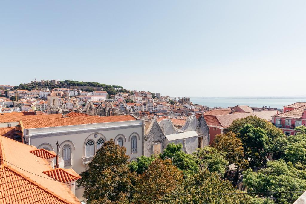 an aerial view of a city with buildings at Lisboa Carmo Hotel in Lisbon