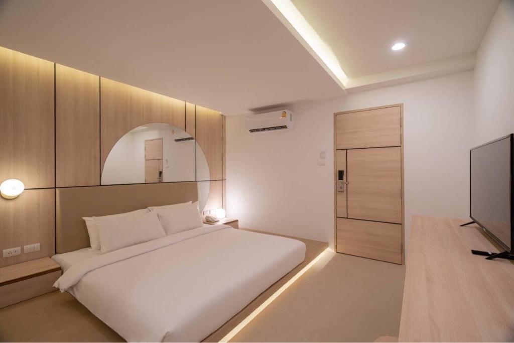 Postel nebo postele na pokoji v ubytování Bedline Hotel - SHA Certified