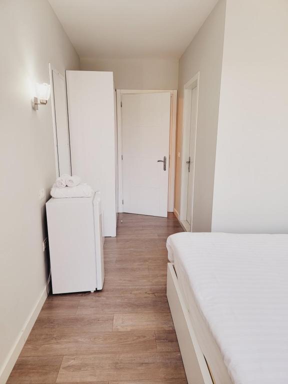 Postel nebo postele na pokoji v ubytování Nuestra Casa