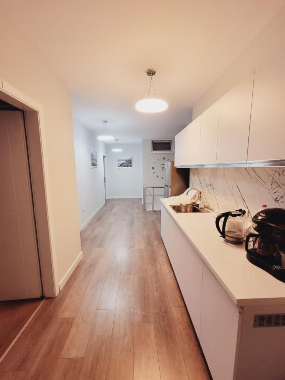 Kuchyň nebo kuchyňský kout v ubytování Nuestra Casa