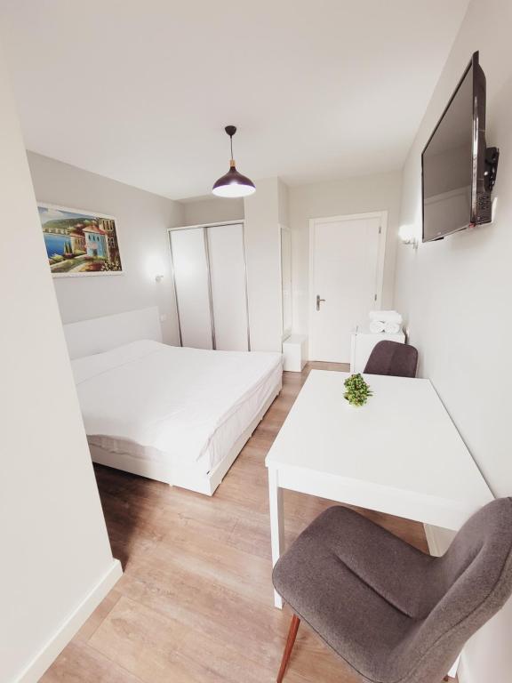 Postel nebo postele na pokoji v ubytování Nuestra Casa