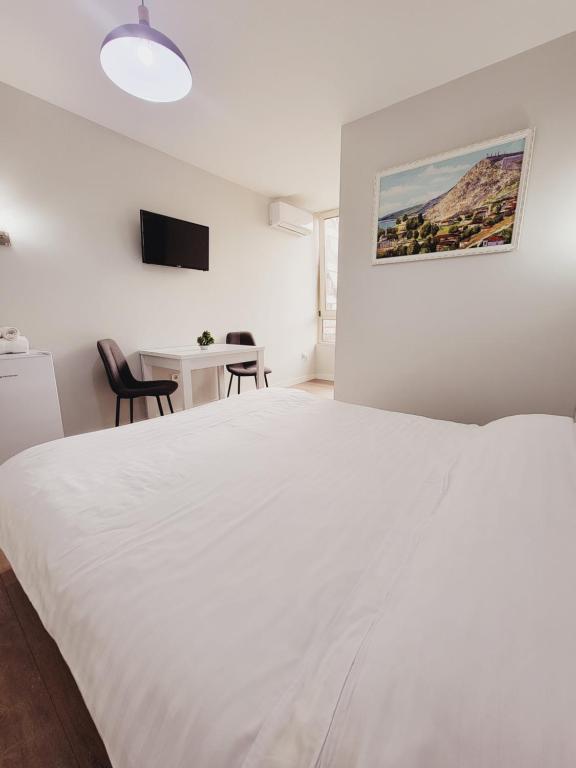Postel nebo postele na pokoji v ubytování Nuestra Casa