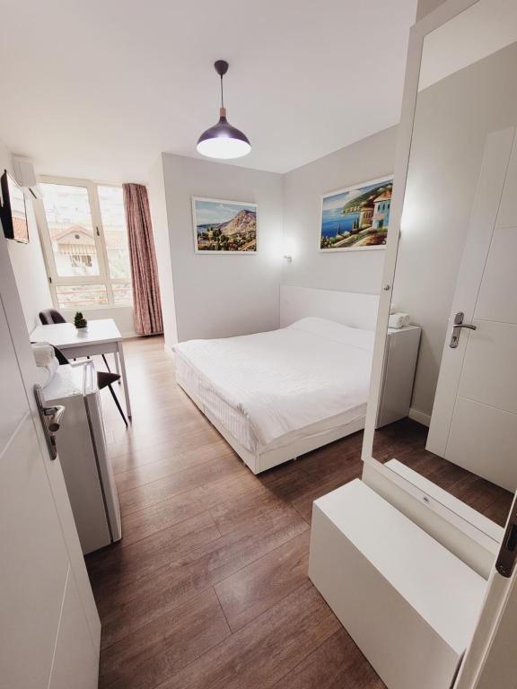 Postel nebo postele na pokoji v ubytování Nuestra Casa