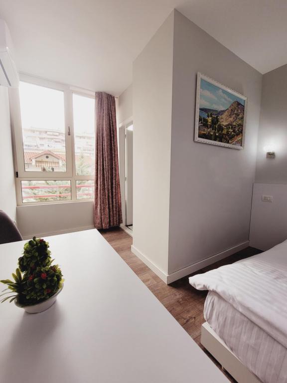 Postel nebo postele na pokoji v ubytování Nuestra Casa
