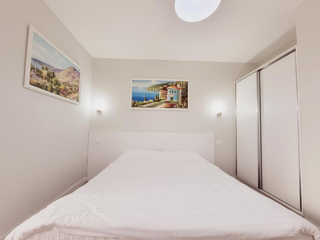 Postel nebo postele na pokoji v ubytování Nuestra Casa